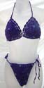Slide sequined beige halter bikini top matched with bow tie thong. Tie on neck and in back