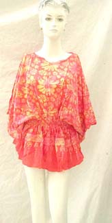 Empire waist kaftan in assorted designs and colors. Made in Indonesia.